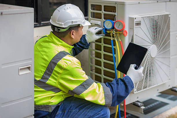 Professional Hvac technician working in Brooksville, MS
